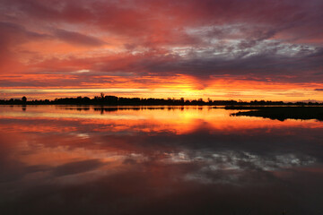 Colorful sunset by the Odra River, Poland.