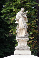 Fototapeta premium Saint John of Nepomuk statue in front of the Cathedral of St. Teresa of Avila in Bjelovar, Croatia