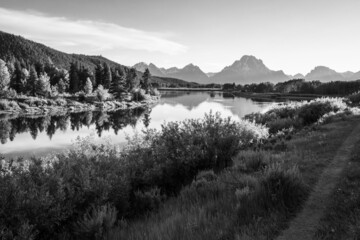 Beautiful evening sunset at Oxbow bend overview snake river, Grand Teton National Park during summer Wyoming. Black and white.