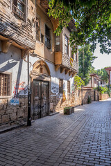 A traditional Turkish mansion and wooden gate in Antalya's historical Kaleici