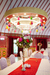 decoration of the table in red colors at the event