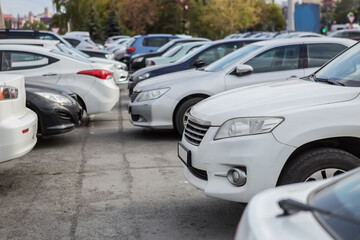 Fototapeta na wymiar Cars in the Parking Lot in the City