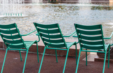 armchairs for relaxation near the fountain