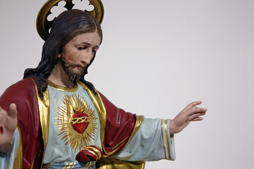 Obraz premium Sacred Heart of Jesus, statue in the church of Assumption of the Virgin Mary in Brodsko Vinogorje, Croatia