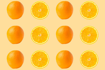 Oranges on an orange background. Orange theme. Delicious fruit