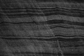 fond abstrait gris et noir de lignes horizontales et courbes.