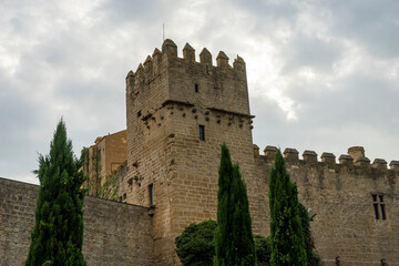 Fototapeta na wymiar Medieval castle of the City of Olite in Navarra, Spain. Wall, battlements and fortress