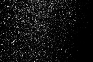 Falling white snow on the black background, snowflakes to overlay