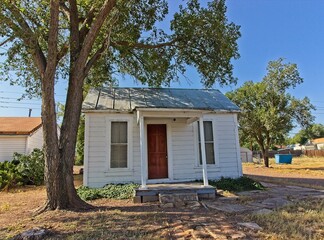 Small Abandoned One Level Home With Porch