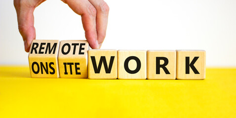 Remote or onsite work symbol. Businessman turns cubes and changes words 'onsite work' to 'remote work'. Beautiful white background. Business, remote or onsite working concept, copy space. - obrazy, fototapety, plakaty