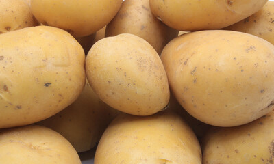 Close-up of a pile of whole potatoes