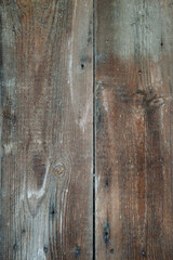A wall of old rotten wooden planks. Natural raw planed texture . flat lay. Copy space.