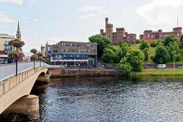 Obraz premium Inverness Castle and Sheriff Court from the banks of the River Ness - Highlands of Scotland - United Kingdom