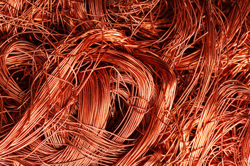 Scrap copper wire fibers as a background.