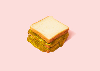 Toasted sandwich with special golden and creative spread. Bizarre concept.