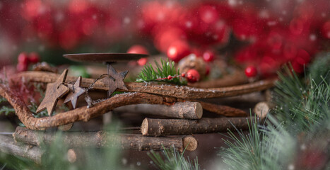 Christmas decorations: wooden wreath with shiny red balls and space for candles