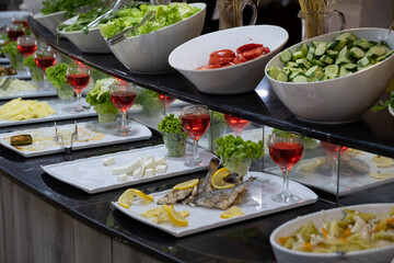 Buffet in the restaurant with different meals, front view