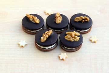 Delicious Ischler cookies with walnuts, small romantic stars around. Homemade baking, Christmas time