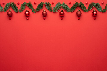 Holiday card with Christmas border ornament on a red background