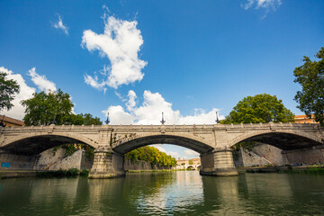 Fototapeta premium Boat ride on the Tiber in Rome.On the river to sail