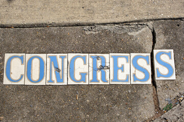 Traditional Congress Street Tile Inlay on Sidewalk in New Orleans, Louisiana, USA	