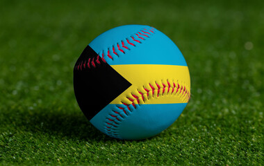Baseball with Bahamas flag on green grass background, close up