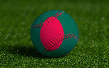 Baseball with Bangladesh flag on green grass background, close up