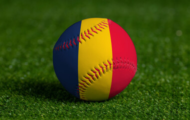 Baseball with Chad flag on green grass background, close up