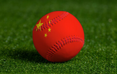 Baseball with China flag on green grass background, close up