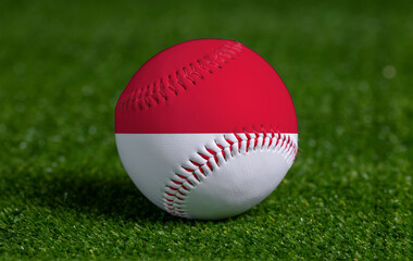 Baseball with Indonesia flag on green grass background, close up
