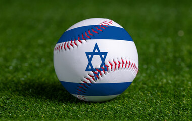 Baseball with Israel flag on green grass background, close up