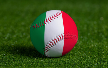 Baseball with Italy flag on green grass background, close up