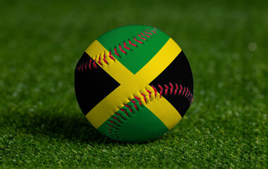 Baseball with Jamaica flag on green grass background, close up