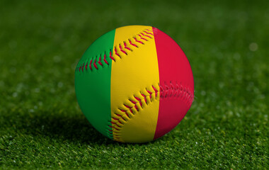 Baseball with Mali flag on green grass background, close up