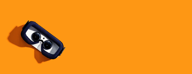 Virtual reality headset with shadow - flat lay