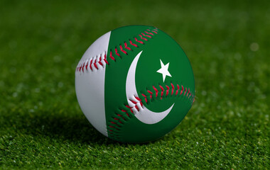 Baseball with Pakistan flag on green grass background, close up