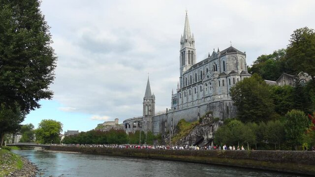 Lourdes, France - August 28, 2021: Sanctuary of our lady of Lourdes, a famous pilgrimage place, world known due to Marian apparitions