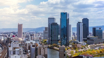 Fototapeta na wymiar Aerial view of Osaka city from sky building. Bird eye view of cityscape at Japan