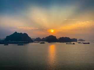Fototapeta na wymiar Sunrise Over Halong Bay Viet Nam