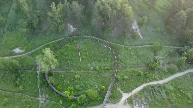 The old bobsleigh track in green area. Aerial drone view of the old bobsleigh slide.