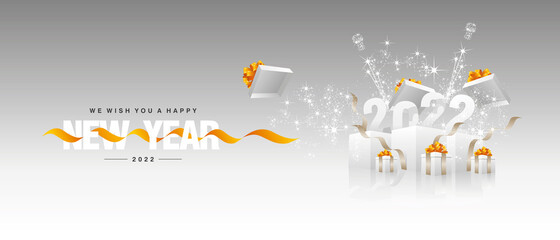 2022 Happy New Year orange yellow ribbon white sparkle firework light gift boxes silver grey background landscape greeting card