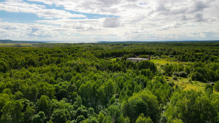 Fototapeta na wymiar Forest, Aerial view, Building, Grass, Summer