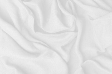 Fototapeta premium The white fabric pattern curve wave on the sea abstract background. Top view of white texture cloth background.