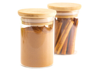 Jars of Cinnamon Isolated on White Background
