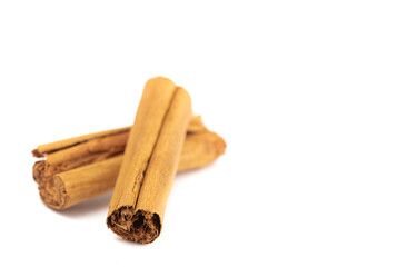 Two Cinnamon Sticks Isolated on a White Background