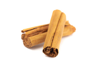 Two Cinnamon Sticks Isolated on a White Background