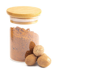 Jars of Whole and Ground Nutmeg on a White Background