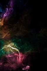 Colorful smoke on black background.