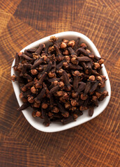 Cloves on a Wooden Butcher Block