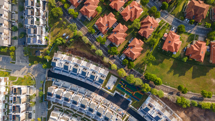 An aerial top down view of luxury residential neighbourhood during sunrise